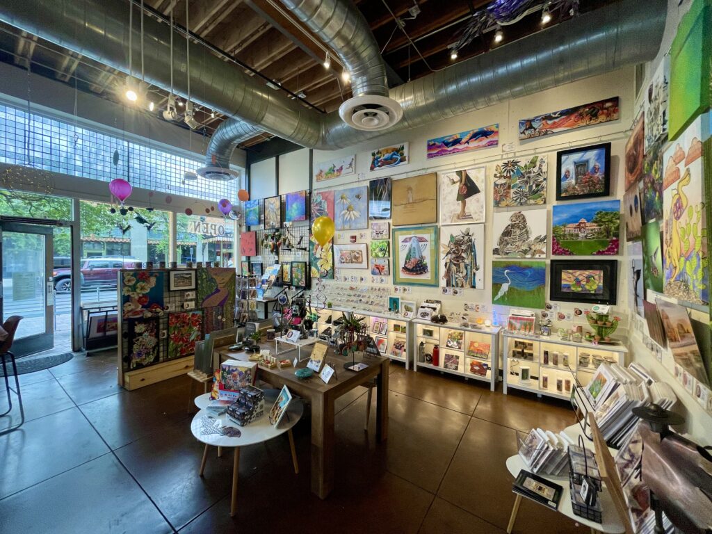 Inside The Tucson Gallery with colorful work by local artists.