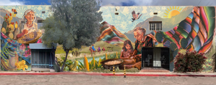 Large Tucson mural with desert landscape, woven textiles, cactus, and family scenes on the Downtown West route.